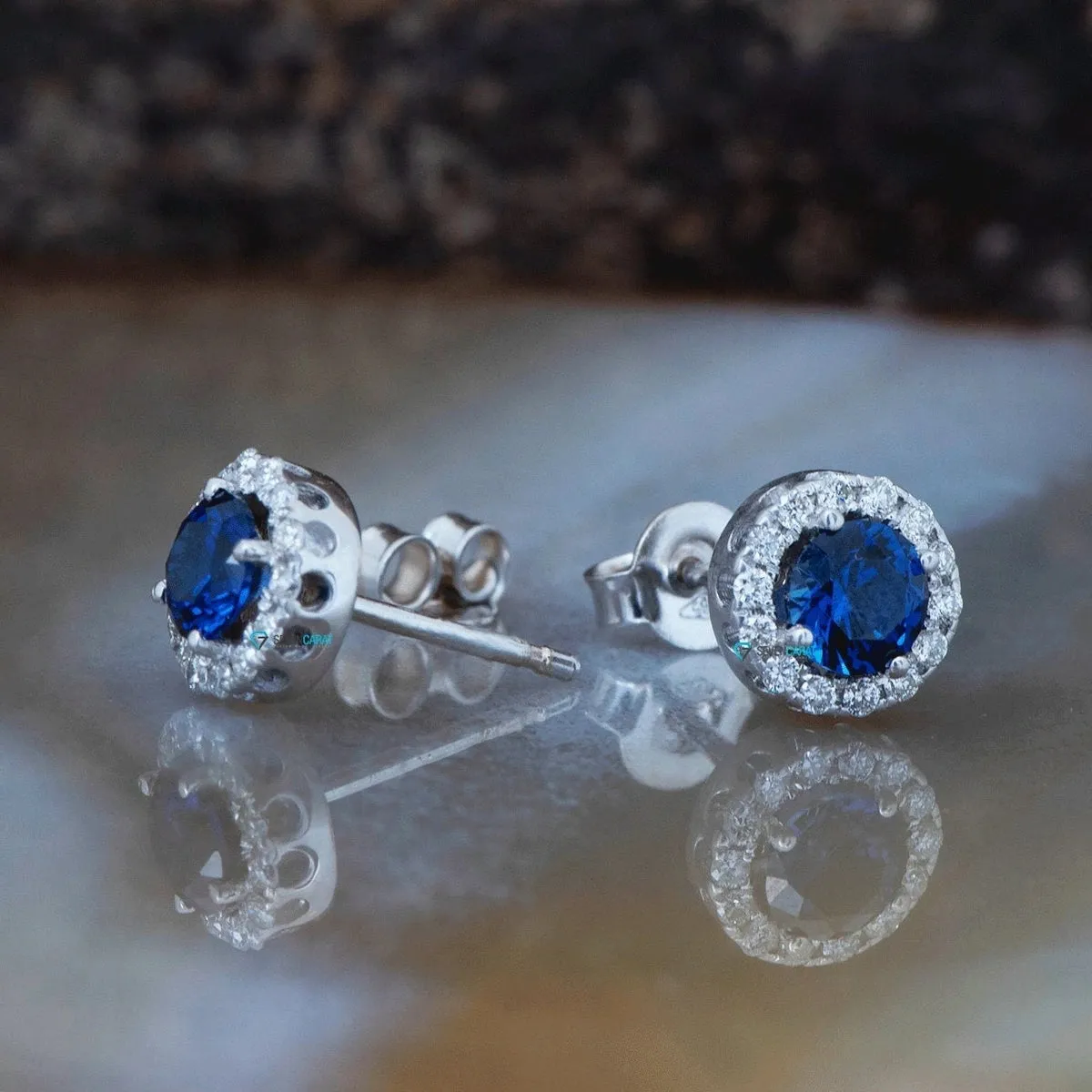 0.80 carat sapphire and diamond earrings gold