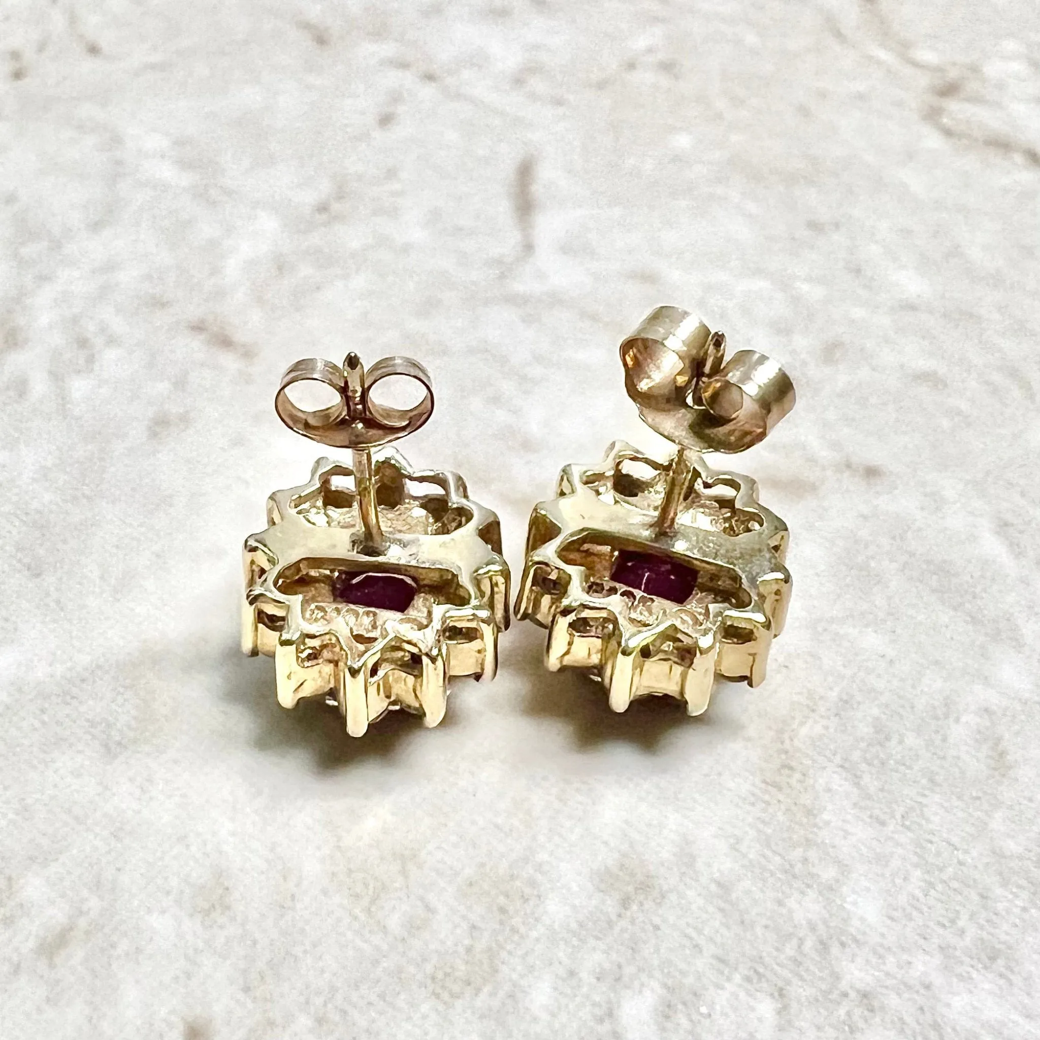 10 Karat Two-Tone Gold Diamond & Oval Ruby Halo Stud Earrings
