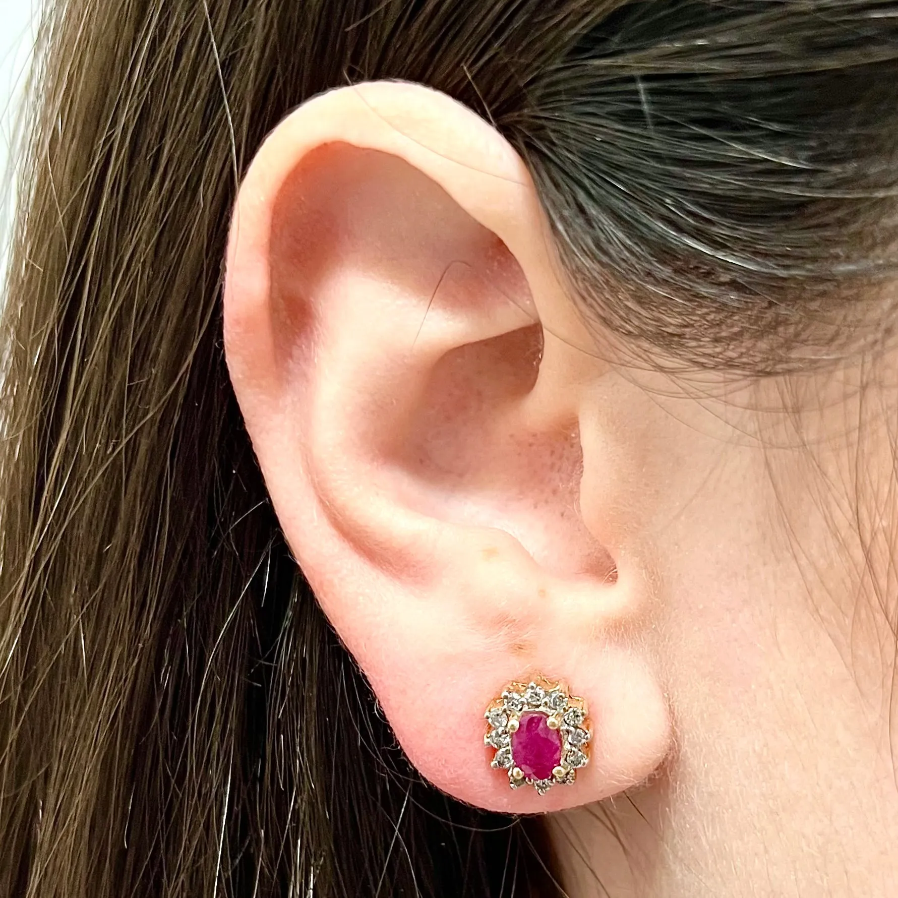 10 Karat Two-Tone Gold Diamond & Oval Ruby Halo Stud Earrings