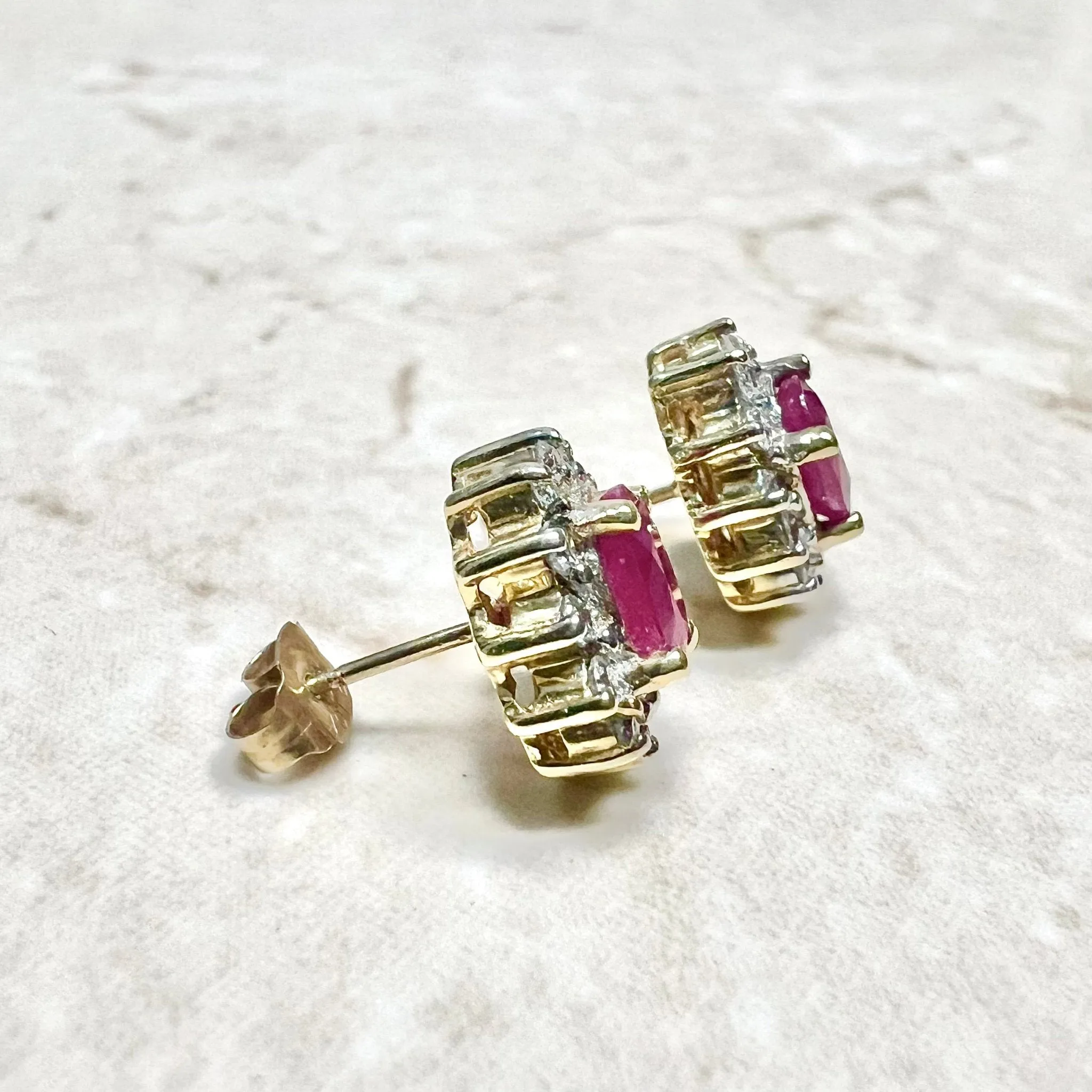 10 Karat Two-Tone Gold Diamond & Oval Ruby Halo Stud Earrings