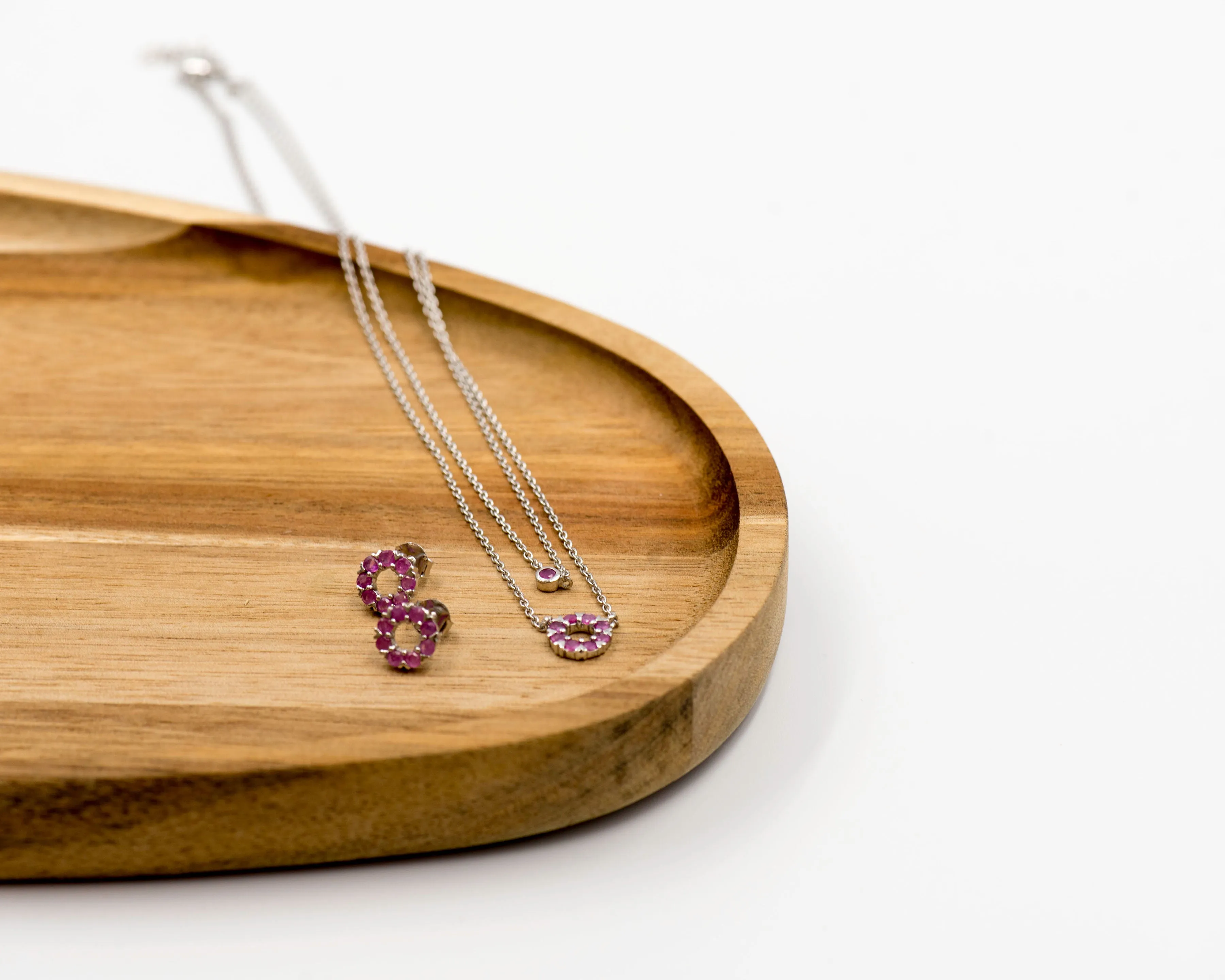 131 "Elegant silver round earrings and chain set, featuring a combination round pendant with July ruby stones.