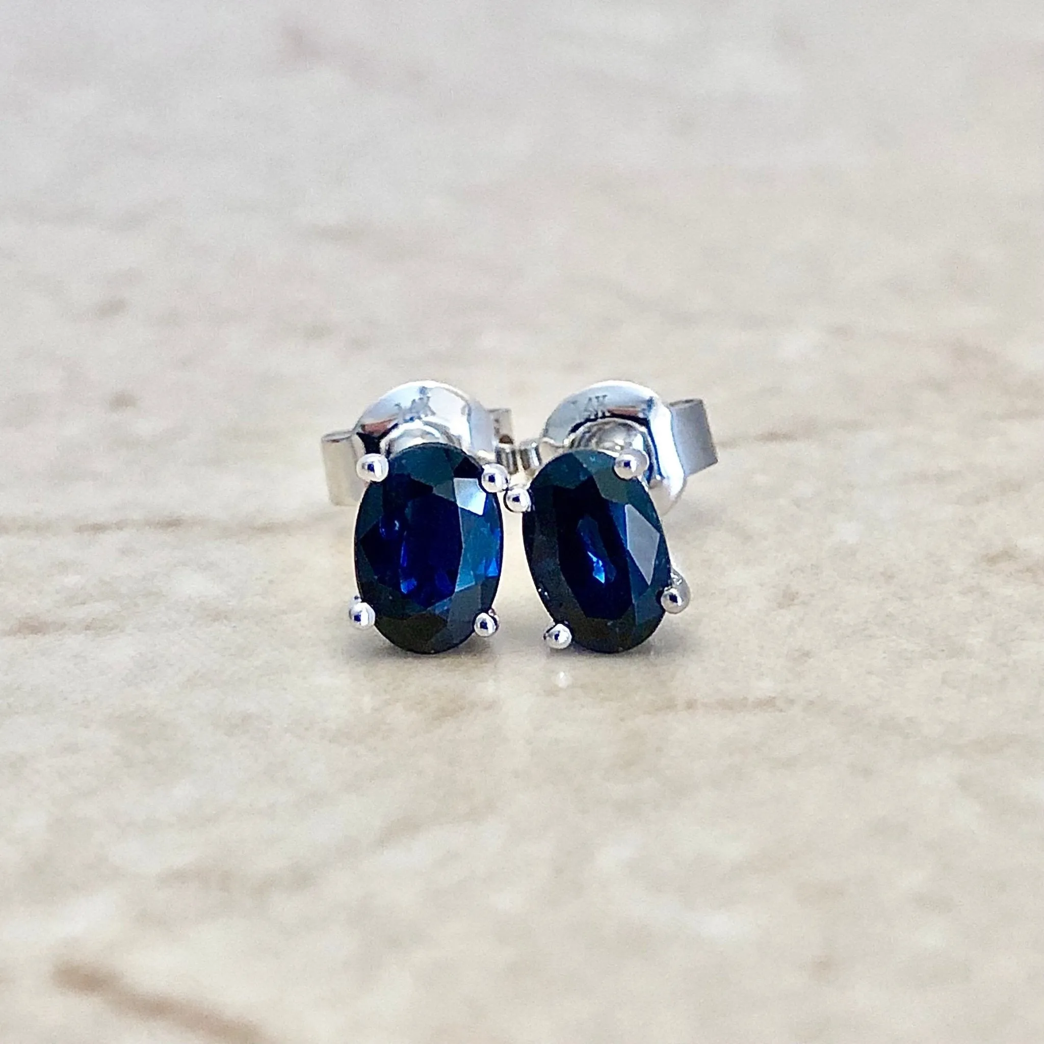 14 Karat White Gold September Birthstone Oval Blue Sapphire Stud Earrings