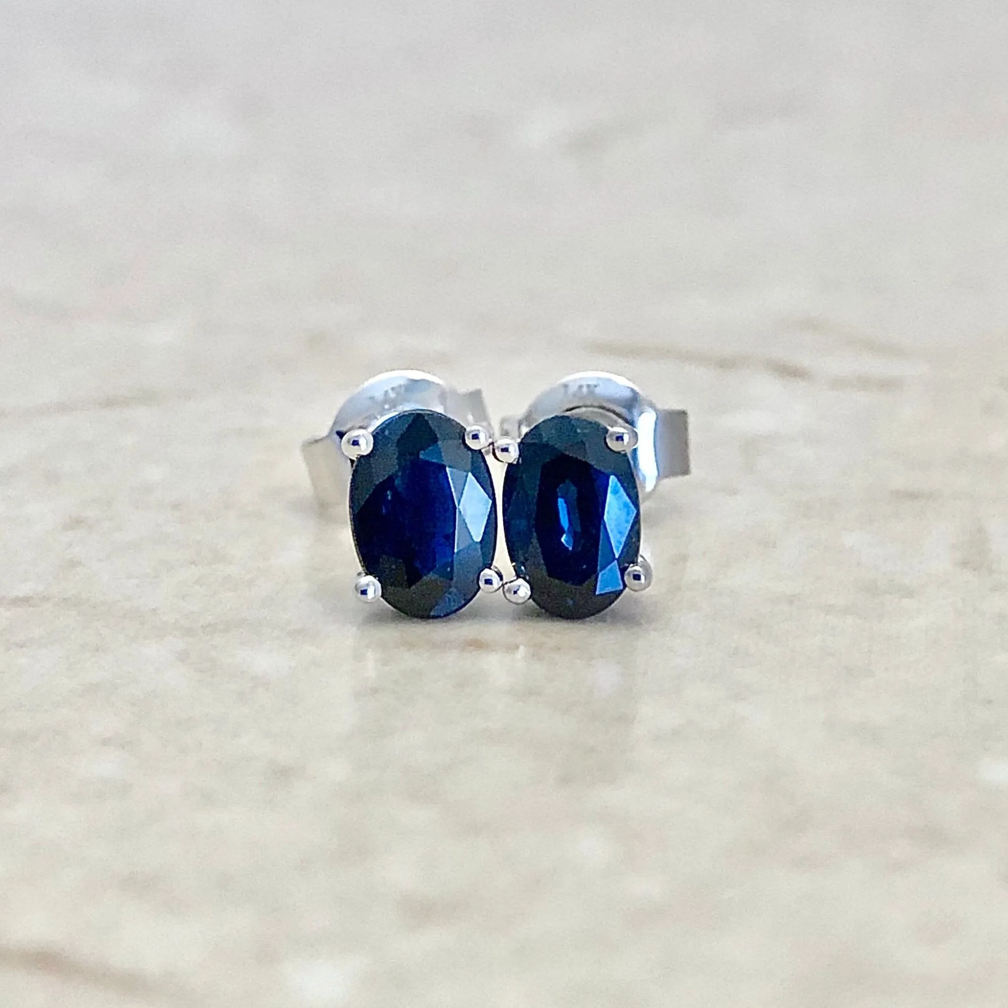 14 Karat White Gold September Birthstone Oval Blue Sapphire Stud Earrings