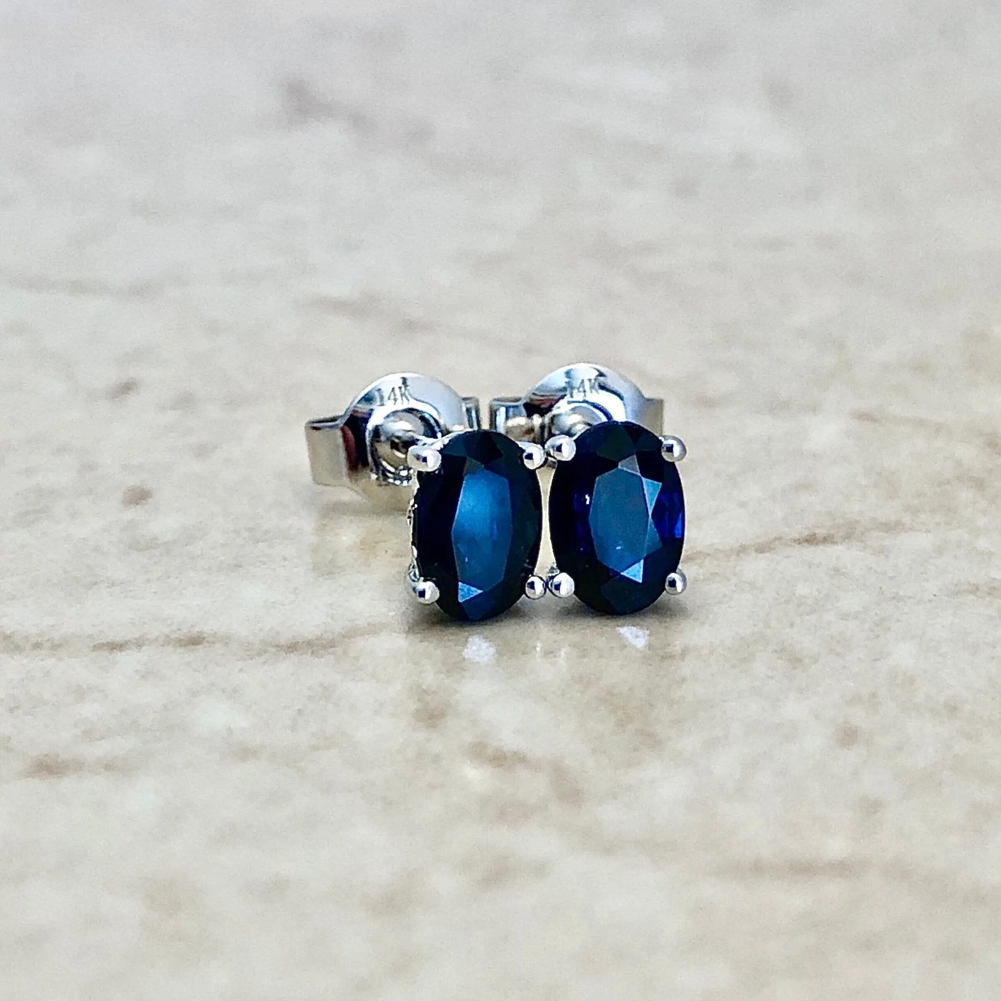 14 Karat White Gold September Birthstone Oval Blue Sapphire Stud Earrings
