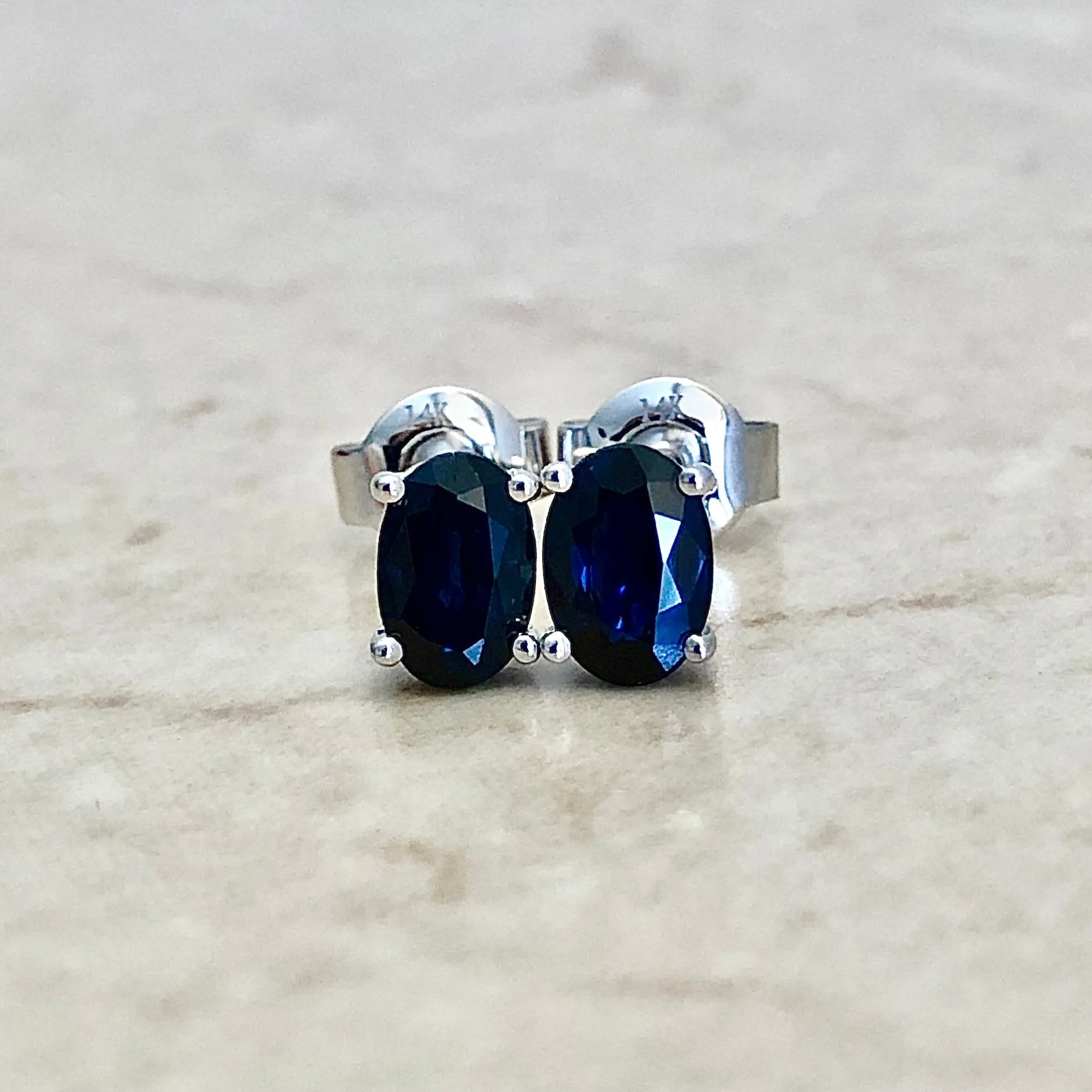 14 Karat White Gold September Birthstone Oval Blue Sapphire Stud Earrings