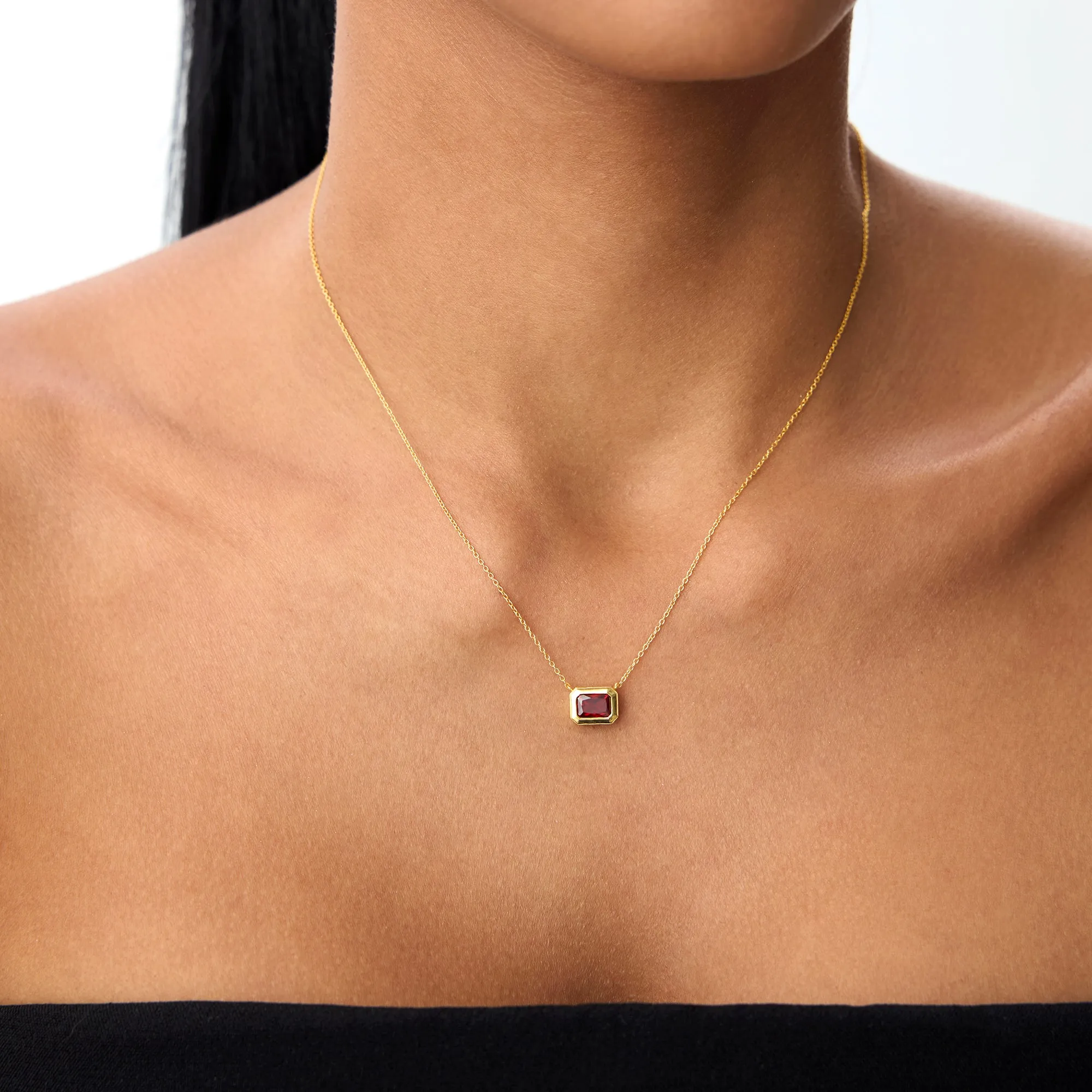14K Gold 0.95 ctw Emerald Cut Bezel Setting Garnet