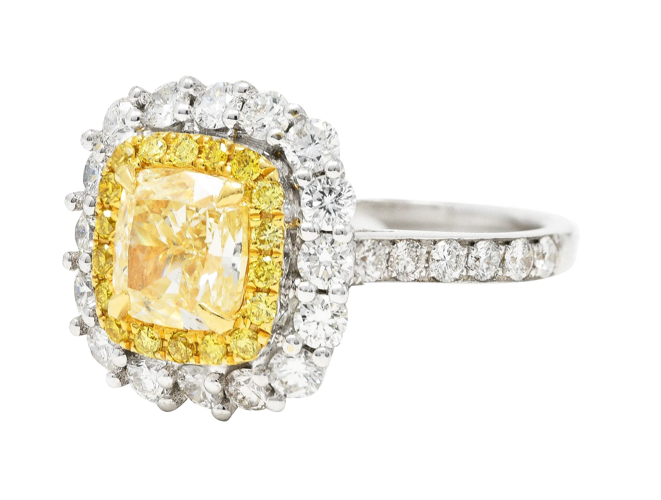 Contemporary 2.16 CTW Cushion Cut Fancy Yellow Diamond Two-Tone 18 Karat Gold Double Halo Gemstone Ring