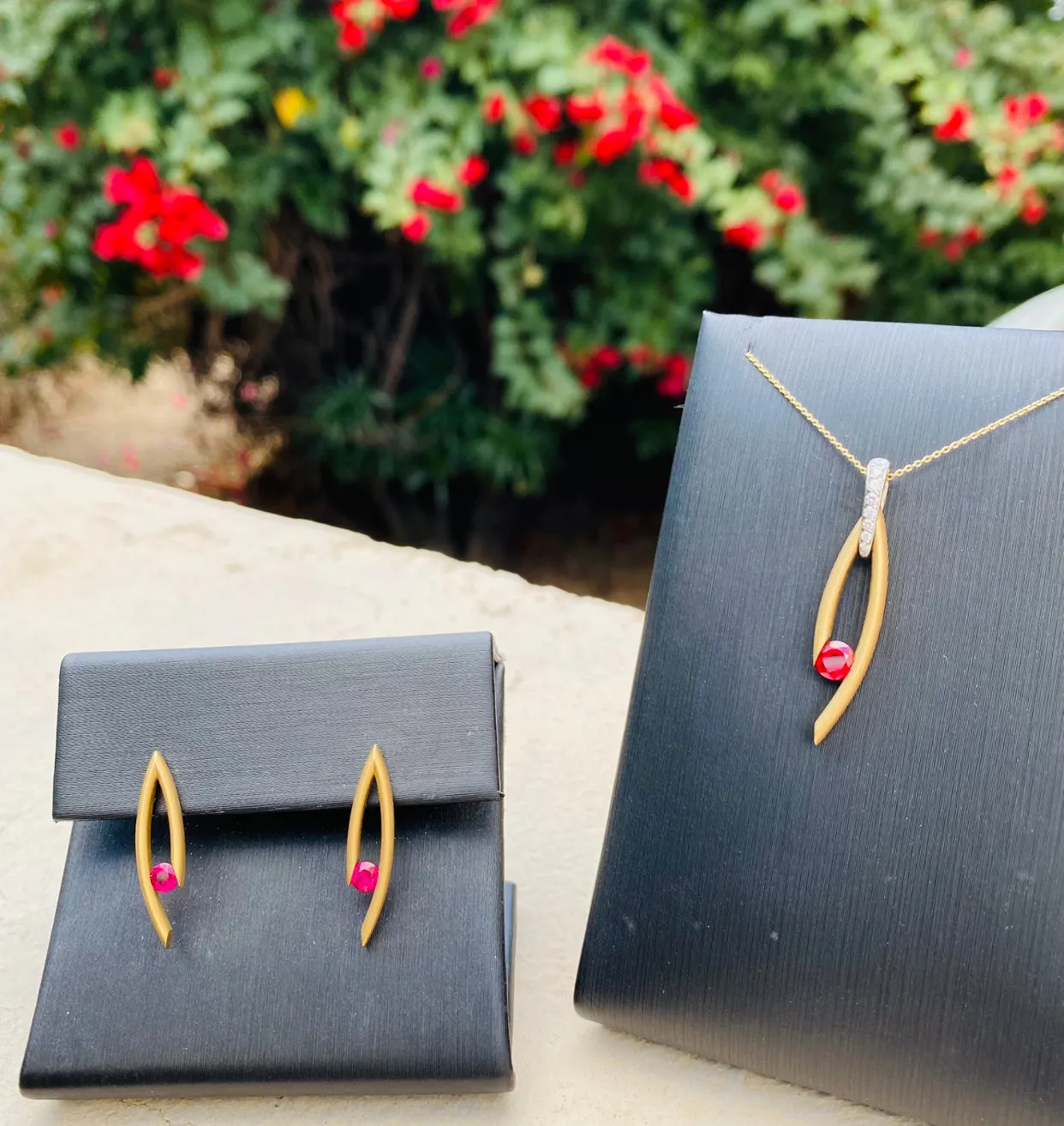 Drop Pendant & Earrings with Tension-set Rubies