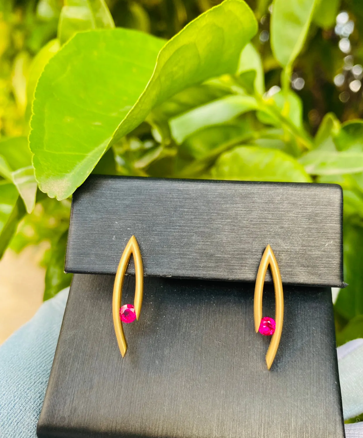 Drop Pendant & Earrings with Tension-set Rubies