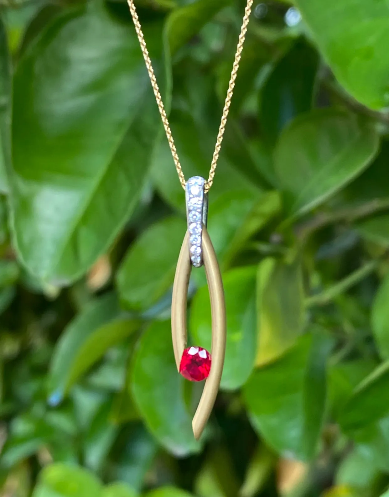 Drop Pendant & Earrings with Tension-set Rubies