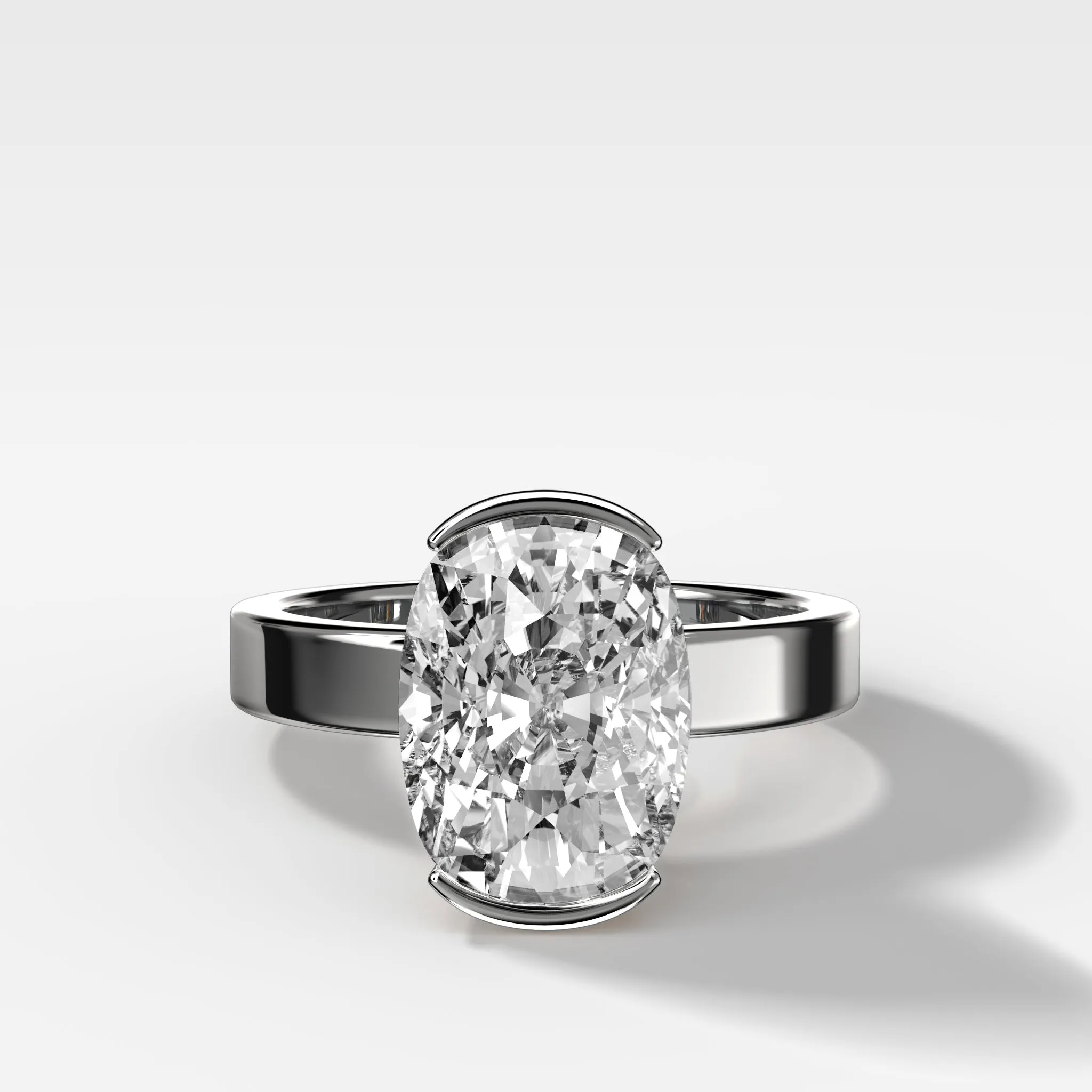 Finest Half Bezel Solitaire Engagement Ring With Elongated Cushion Cut Diamond