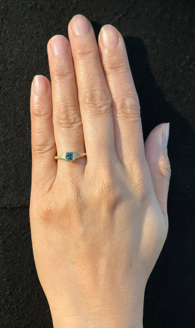 Forged Cushion Cut Blue Zircon Ring in 18k gold