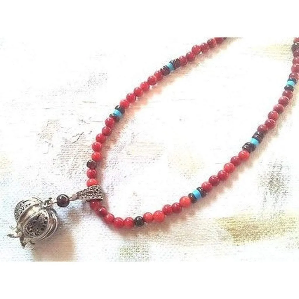Necklace for woman. Sterling Silver Pomegranate Pendant set with a garnet.