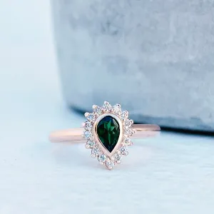 Radiant Pear Cut Green Tourmaline with Diamond Halo Ring