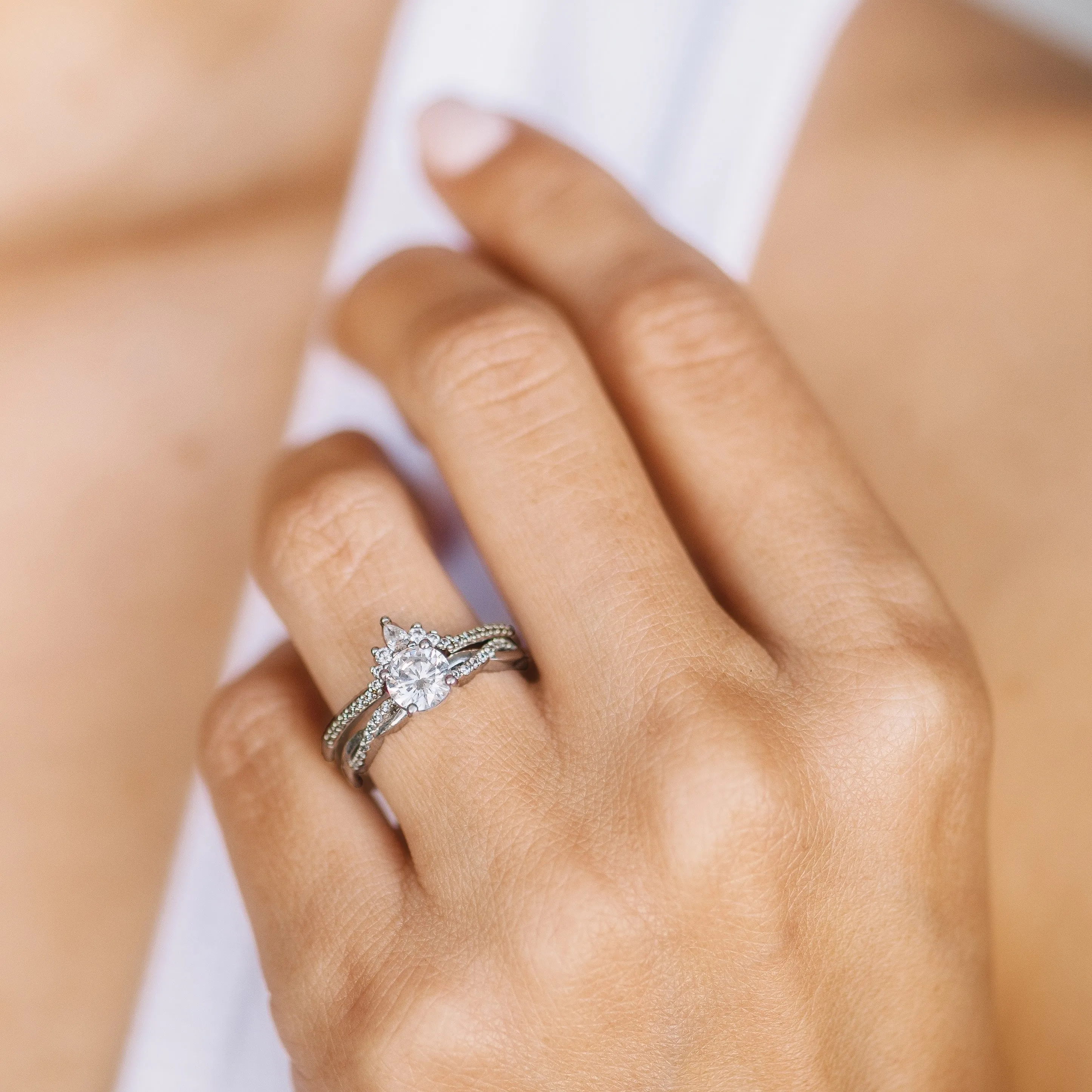 Solitaire Diamond and Twisted Diamond Pavé Band Engagement Ring