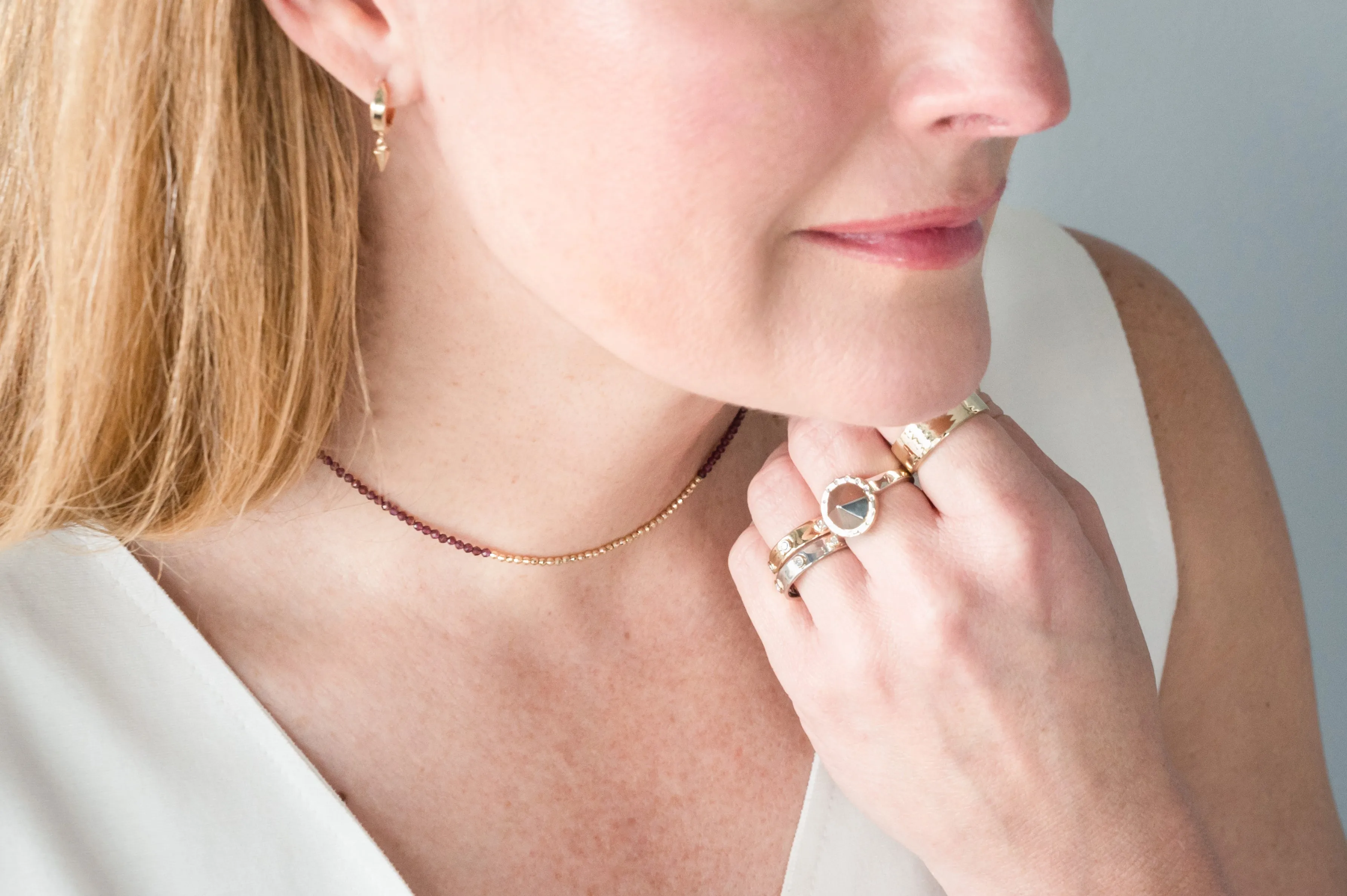 The "Glimmer Choker" with Yellow Gold and Garnet