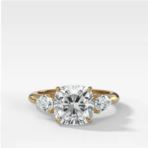 Three Stone Engagement Ring With Pear Side Stones and Cushion Cut Diamond