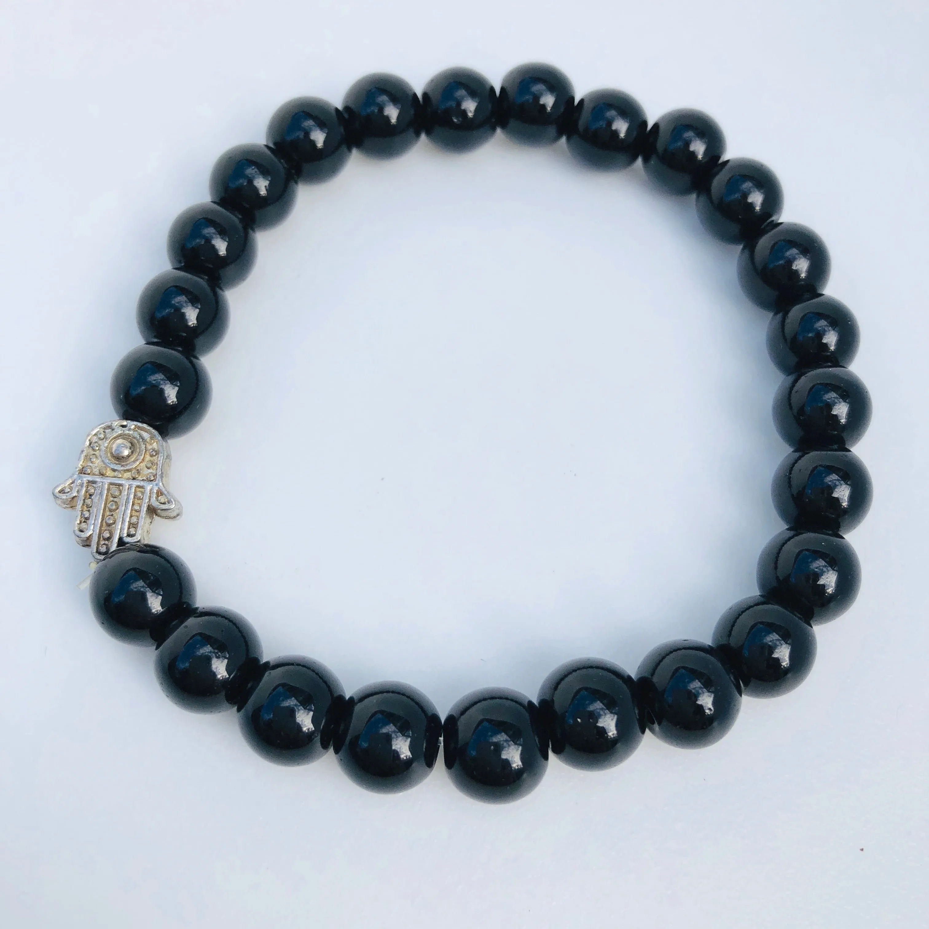 TM. Black Bead Hamsa Bracelet